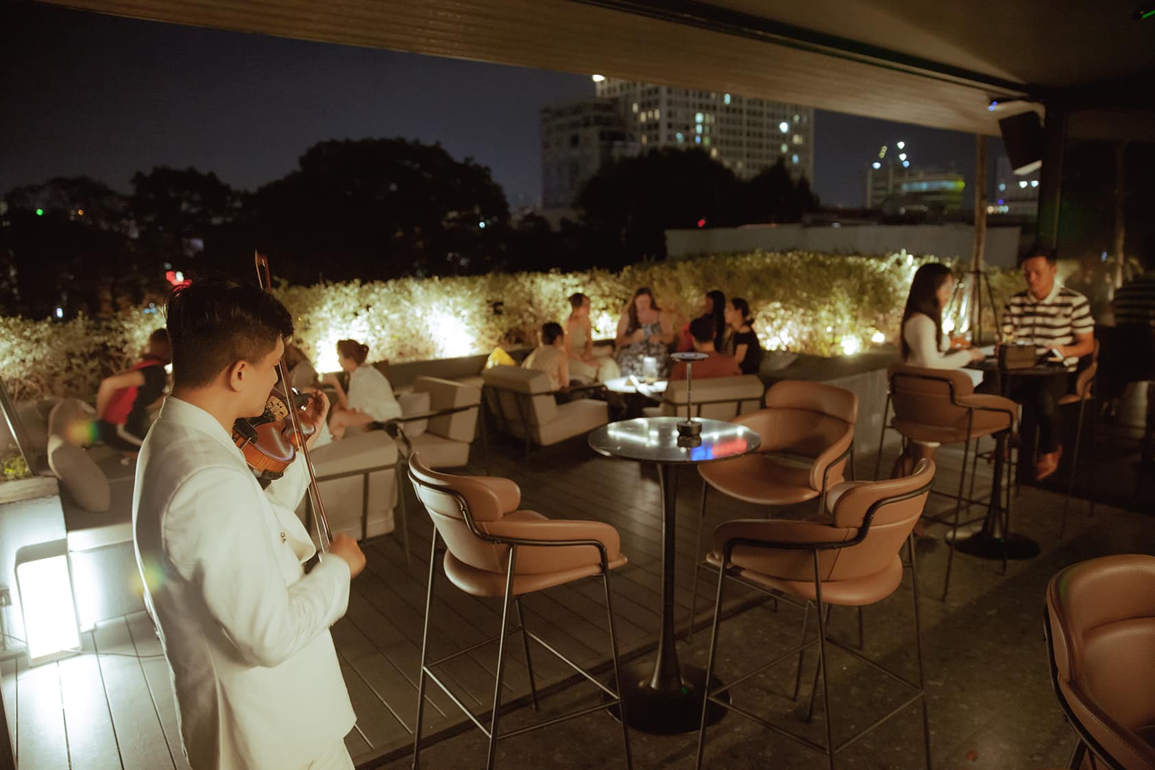 inBetween rooftop District 3 airy space with sparkling city views