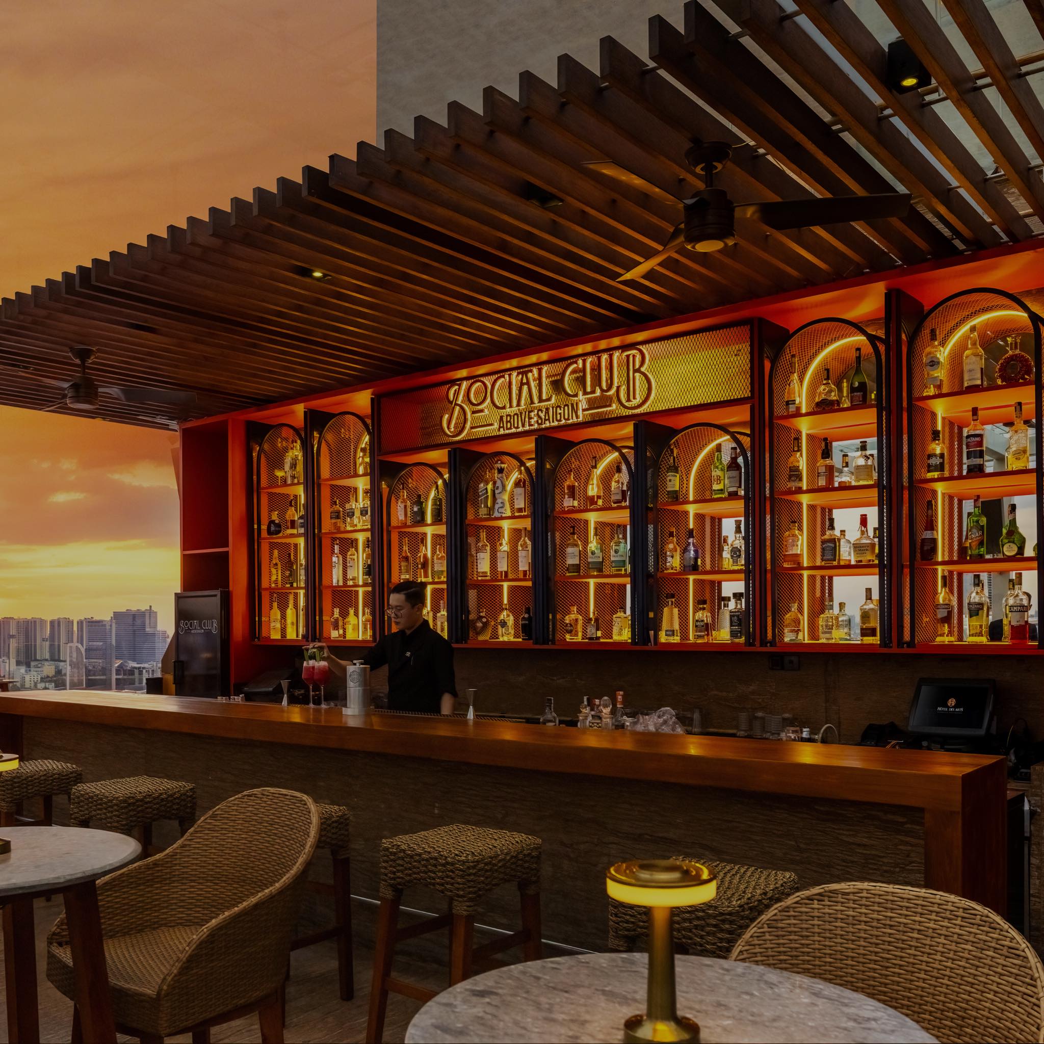 Social Club Rooftop District 3 luxurious space with panoramic Saigon night views
